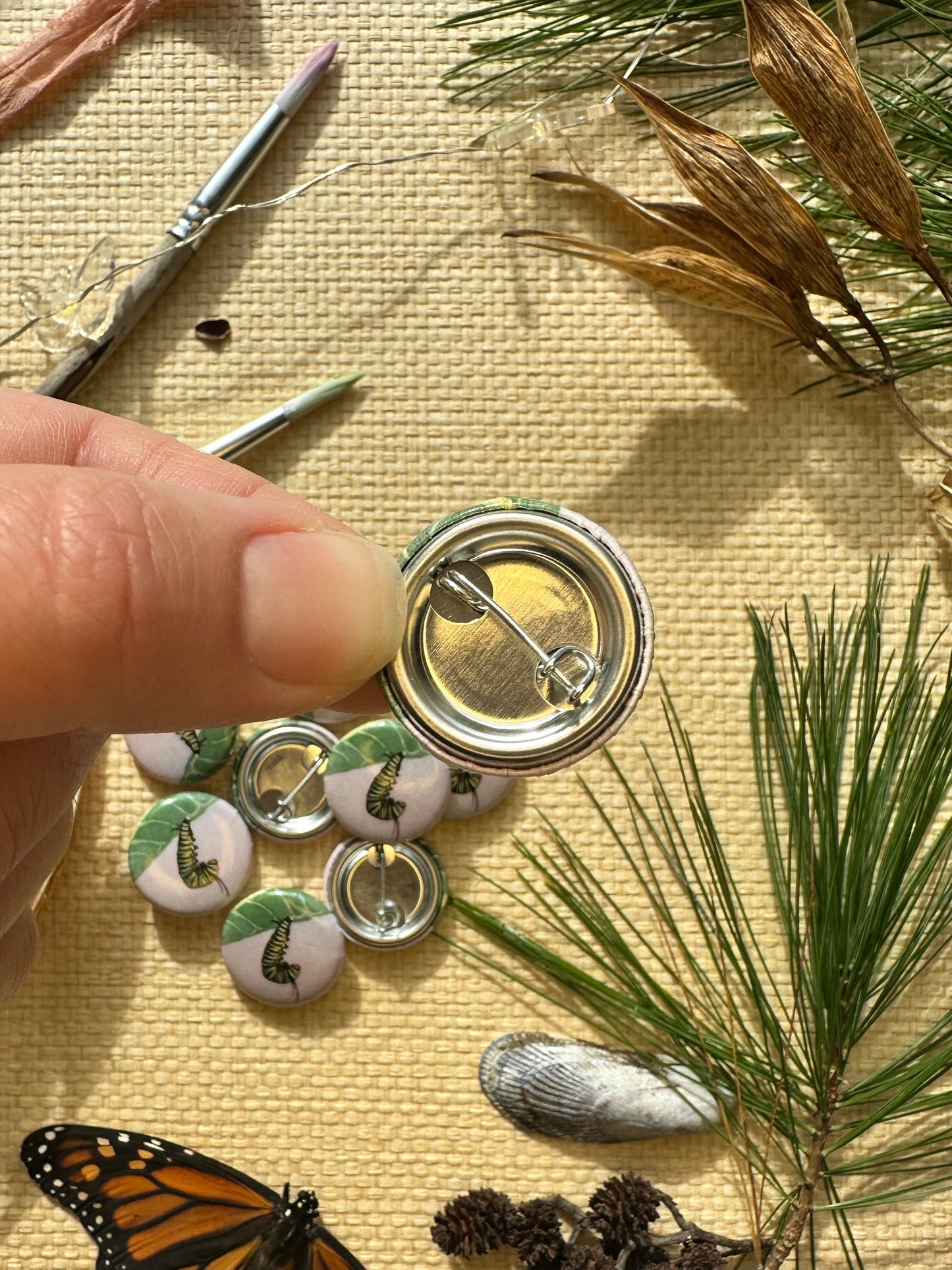 Monarch Caterpillar "J" on 1" Pin Button