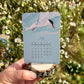 2024 Catching Flight Desk Calendar with Natural Wood Stand